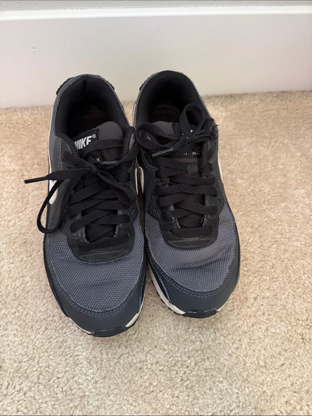 Nike gray and black Air Max sneakers with white Swoosh bits size 6